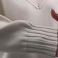 Women's V-Neck Knit Top and Pleated Skirt Set