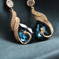 🦚 50% OFF NOW!✨ Phoenix Peacock Earrings – AAA CZ Gems & Lightweight Design – Elegant Gold Plated Statement Jewelry 💎