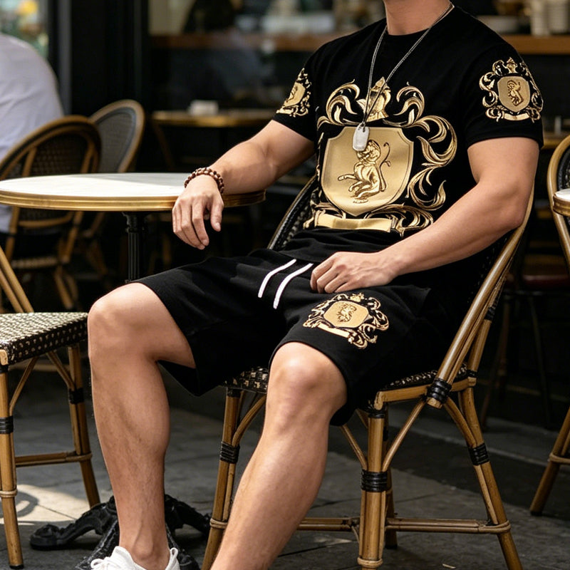 🖤👕🩳 50% OFF Men’s Gold Crest T-Shirt & Shorts Set✨ – Luxury Print, Breathable Comfort & Instant Summer Style